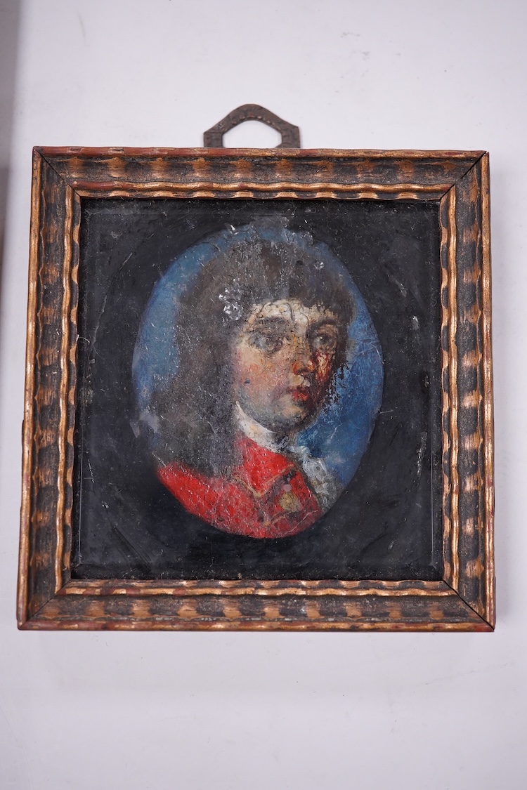 Late 18th century School, Portrait miniature of a young boy wearing a frock coat, oil on metal panel, possibly copper, together with a decorative portrait of a young boy in armour, each framed, largest 11 x 7.5cm